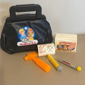 Fisher-Price Black Medical Play Kit with Yellow and Orange Accessories